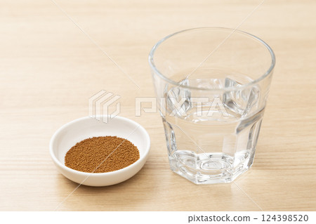 Kudzu soup and water on the table 124398520