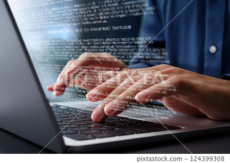 Image of writing a report or article. Creating a document. Close-up of a hand typing on a laptop keyboard. Off 124399308