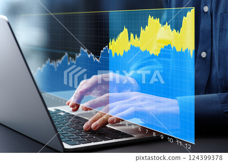 Predictive analysis of market trends. Demand forecast graphs on dashboard. A notebook for marketing data analysis. Predictive analysis of market trends. Demand forecast graphs on dashboard. A notebook for marketing data analysis. 124399378