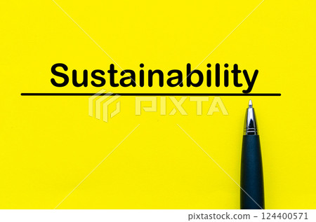 Sustainability text written on yellow cover background Sustainability text written on yellow cover background 124400571
