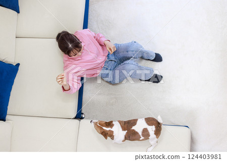 Dog and young lady 124403981