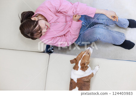 Dog and young lady Dog and young lady 124403983