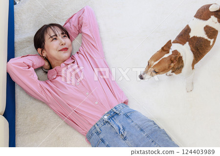 Dog and young lady Dog and young lady 124403989