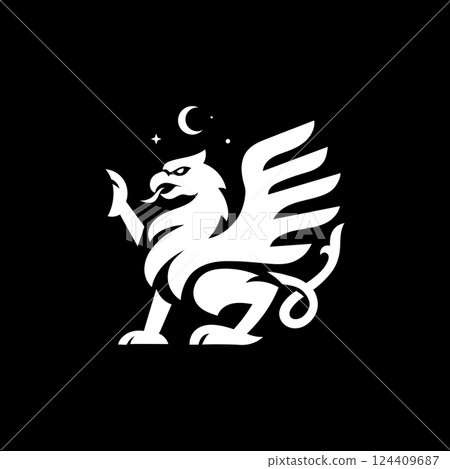 Mythical griffin, the griffin sits on its hind legs with its wings spread 124409687