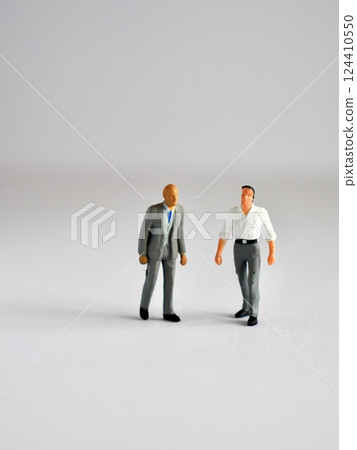 Two businessmen walking together 124410550