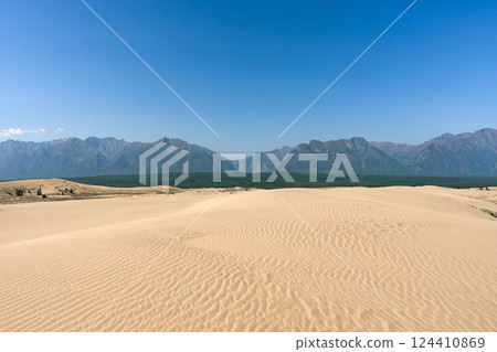 Chara sands and Kodar mountain range Chara sands and Kodar mountain range 124410869