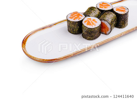 Freshly prepared sushi rolls arranged on a serving platter 124411640