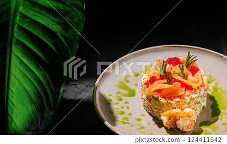 Gourmet seafood dish served elegantly on a plate 124411642