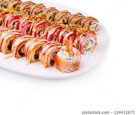 Colorful sushi rolls served on a white plate at a restaurant Colorful sushi rolls served on a white plate at a restaurant 124411671