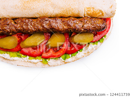 Freshly made sandwich with grilled meat and vegetables 124411739