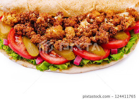 Crispy fried cauliflower sandwich with fresh vegetables and sauce 124411765