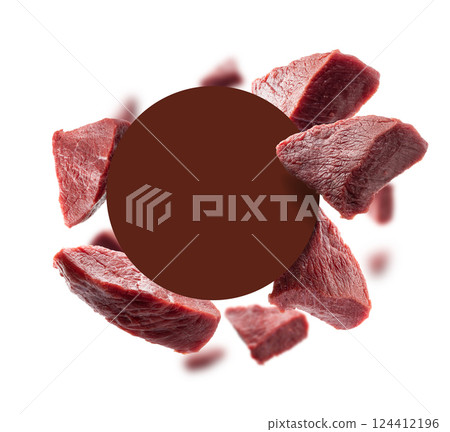 Pieces of fresh meat levitate on a white background 124412196