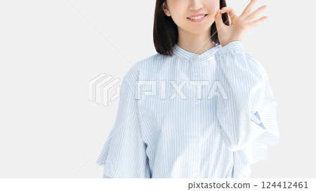 Woman/businesswoman making an OK pose 124412461