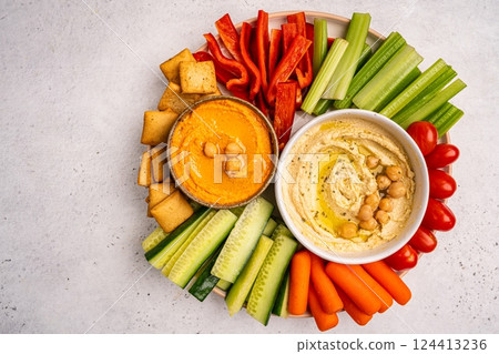 Various hummus dips, healthy and vegan snack Various hummus dips, healthy and vegan snack 124413236
