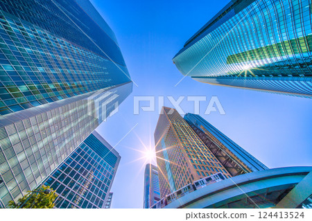 Tokyo cityscape in Japan: A new era begins. A glittering spring-like glow... Overlooking the Shiodome business district, etc. - March 21st 124413524