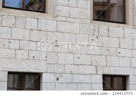 Medieval Brick Facade with Windows 124413753