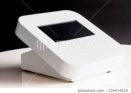 Modern Sleek White Desktop Device with Digital Touchscreen Interface on Reflective Surface Modern Sleek White Desktop Device with Digital Touchscreen Interface on Reflective Surface 124414026