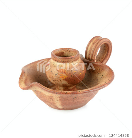 Clay candlestick isolated on white. Clay candlestick isolated on white. 124414838
