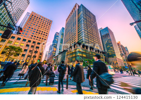Tokyo cityscape in Japan. After work... View of the intersection in front of Otemachi Station from Otemachi. Marunouchi is in the background. March 21st. Tokyo cityscape in Japan. After work... View of the intersection in front of Otemachi Station from Otemachi. Marunouchi is in the background. March 21st. 124415130