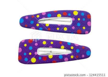 Colored hair clips isolated on white background. Colored hair clips isolated on white background. 124415511