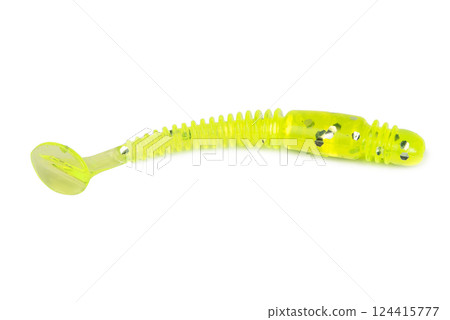 Fishing lure silicone twister isolated on white background. Fishing lure silicone twister isolated on white background. 124415777
