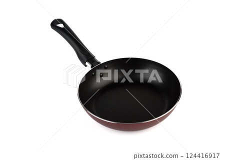 New kitchen frying pan with non-stick coating and black handle on white background. New kitchen frying pan with non-stick coating and black handle on white background. 124416917