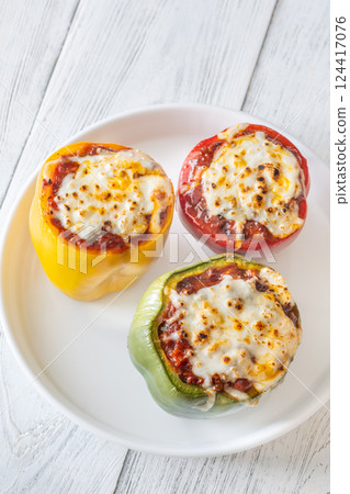 Juicy Baked Bell Peppers Stuffed with Flavorful Bolognese and Topped with Golden Mozzarella Juicy Baked Bell Peppers Stuffed with Flavorful Bolognese and Topped with Golden Mozzarella 124417076