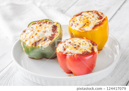 Juicy Baked Bell Peppers Stuffed with Flavorful Bolognese and Topped with Golden Mozzarella Juicy Baked Bell Peppers Stuffed with Flavorful Bolognese and Topped with Golden Mozzarella 124417079