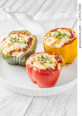 Juicy Baked Bell Peppers Stuffed with Flavorful Bolognese and Topped with Golden Mozzarella Juicy Baked Bell Peppers Stuffed with Flavorful Bolognese and Topped with Golden Mozzarella 124417080