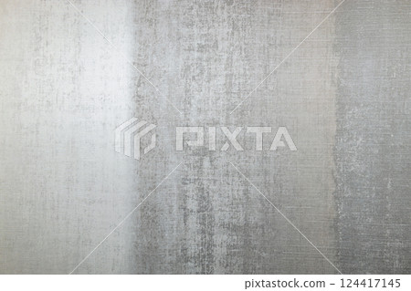 Subtle Silver Metallic Texture Background with Soft Reflections 124417145
