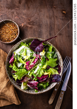 Bowl of fresh green salad mix 124417285