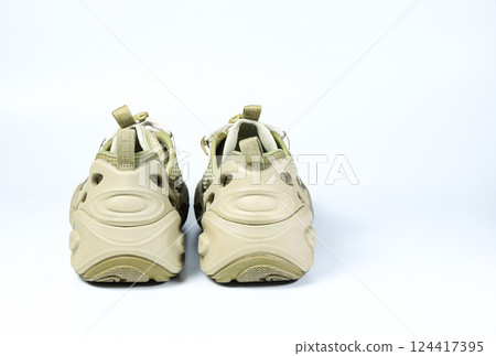 Heel side of Casual hiking shoes, trekking shoe isolate on white background. Heel side of Casual hiking shoes, trekking shoe isolate on white background. 124417395