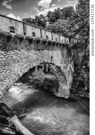 Steinerner Steg bridge, iconic landmark in Merano, South Tyrol, Italy 124417536