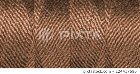 Brown sewing thread texture Brown sewing thread texture 124417686