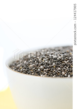 Bowl of healthy chia seeds Bowl of healthy chia seeds 124417905