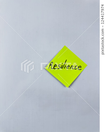 Sticky note with the word Resilience written on it, placed on a white background. Ideal for illustrating themes of strength, endurance, and perseverance. Great for concept creation Sticky note with the word Resilience written on it, placed on a white background. Ideal for illustrating themes of strength, endurance, and perseverance. Great for concept creation 124417974