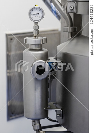 Equipment in the modern laboratory of the medicine factory. Sterile machine for medicine manufacture Equipment in the modern laboratory of the medicine factory. Sterile machine for medicine manufacture 124418222