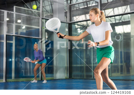 Padel tennis teenage girl in court ready for play 124419108
