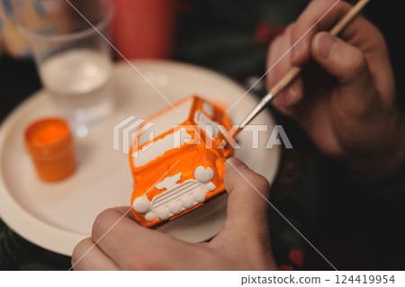 A Creative and Artistic Painting Project Featuring a Miniature Orange Car to Enjoy A Creative and Artistic Painting Project Featuring a Miniature Orange Car to Enjoy 124419954