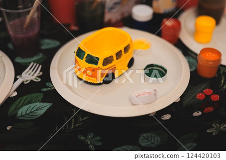 A Colorful Painted Van Model is wonderfully displayed on a Creative Table for everyone to admire 124420103