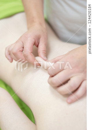 Caucasian woman on manual back massage.  124420184