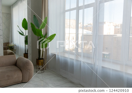 Abstract background of a room with a large flower, palm tree and window. Space for the text. 124420910