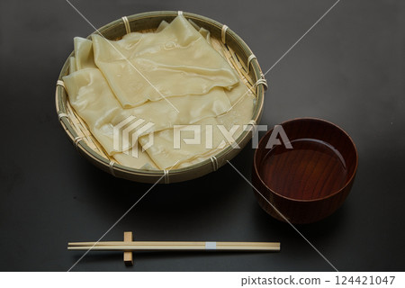 Boiled and served in a colander, wide Oni Himokawa udon noodles Boiled and served in a colander, wide Oni Himokawa udon noodles 124421047