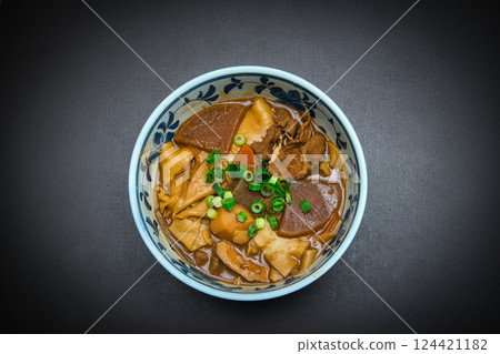 Miso-boiled udon noodles with various ingredients Miso-boiled udon noodles with various ingredients 124421182