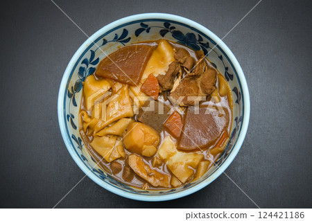 Miso-boiled udon noodles with various ingredients Miso-boiled udon noodles with various ingredients 124421186