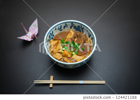 Miso-boiled udon noodles with various ingredients Miso-boiled udon noodles with various ingredients 124421188