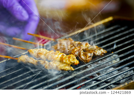 Golden Huang Attractions, Charcoal Grilled Meat Skewers Golden Huang Attractions, Charcoal Grilled Meat Skewers 124421869
