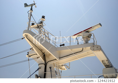 Rooftop mast of a ferryboat in motion Rooftop mast of a ferryboat in motion 124421912