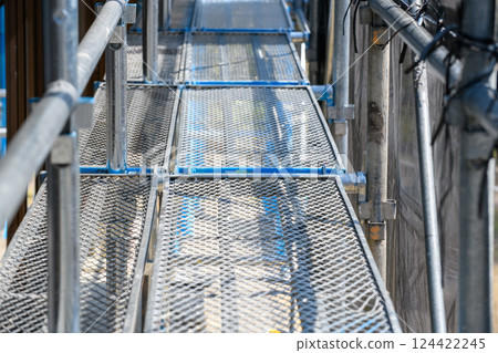 Scaffolding planks and posts for safety Scaffolding planks and posts for safety 124422245