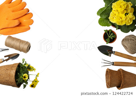 Gardening gloves, tools, and flowers are organized in a top view space for planting, isolated on white, PNG 124422724